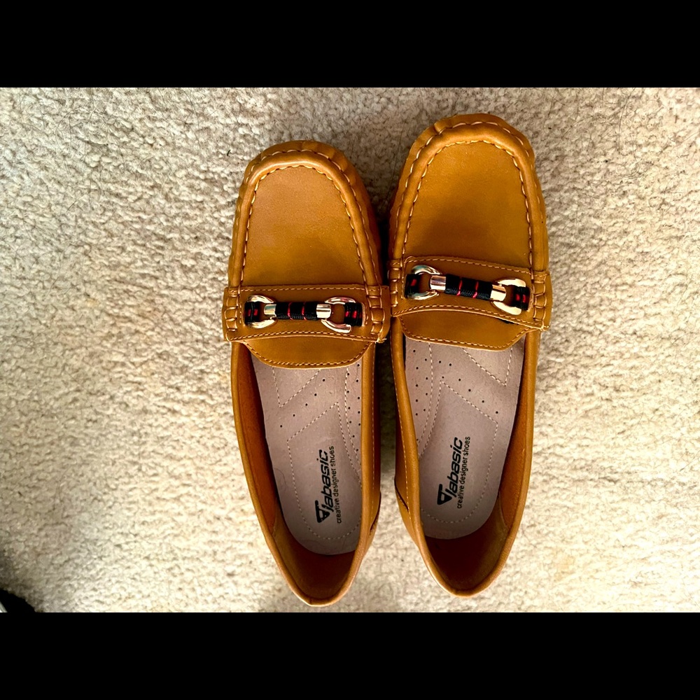 Women’s brown loafer. Never worn still in box